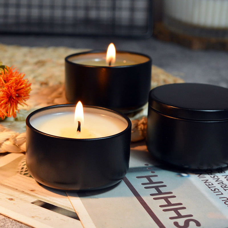 Citronella mosquito repellent candle in portable travel tin for outdoor camping and garden